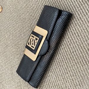 Anne Klein black patent leather clutch with gold hardware